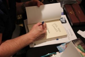 Trying to keep my handwriting pretty while not making people wait.